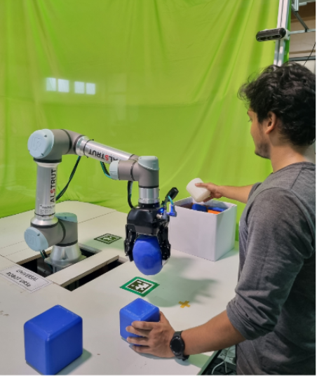 UR5 robot arm performing grasping task